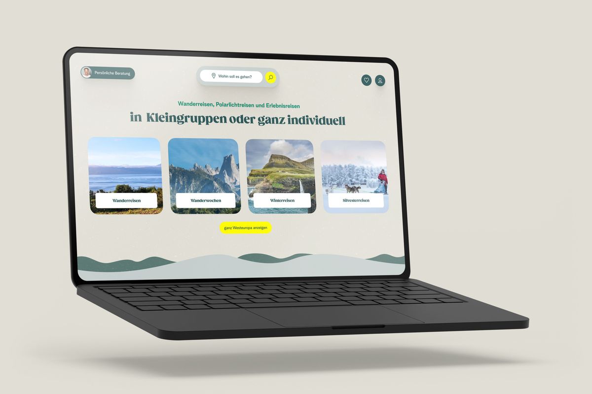 Darstellung der Website auf einem aufgeklappten Macbook.