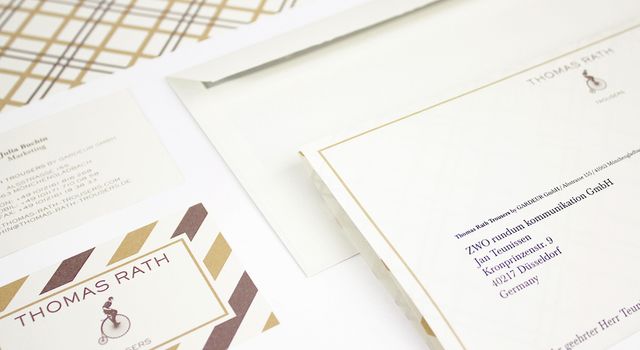 Detailansicht des Briefbogens und der Visitenkarte für Thomas Rath Trousers